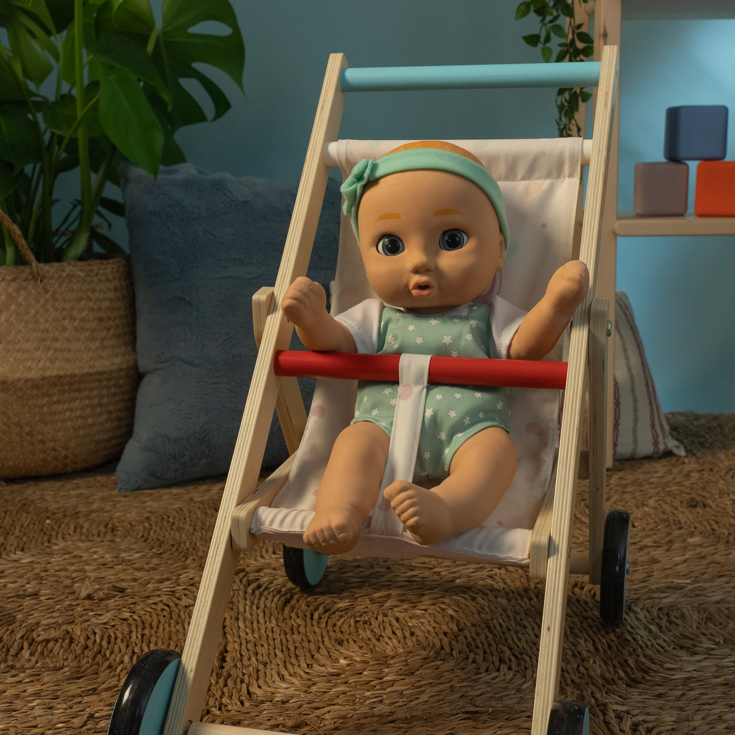 Baby doll Be loved dolls sam in trolley green clothes open eyes